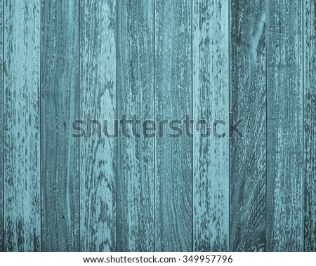Pale blue Winter view of old planked floor for use as an advertising backdrop/message.