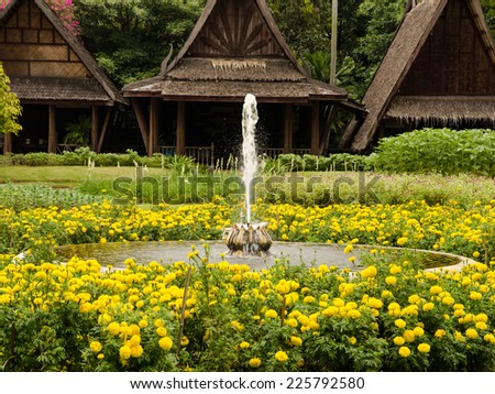 Fountain in the flowers garden, Thai style