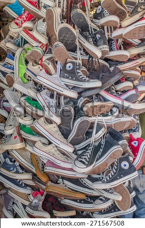 BANGKOK - APR 18:second hand Shoes shop at Chatuchak Weekend Market Apr 18, 2015 in Bangkok, Thailand. Chatuchak is one of the world\'s largest markets covering over 35 acres with 15,000 stalls