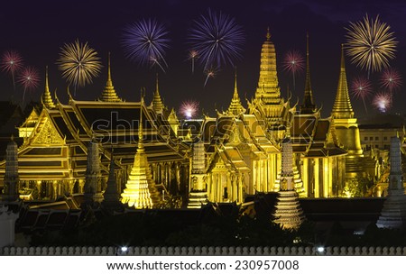 The beauty of the Emerald Buddha Temple at twilight. And while the gold of the temple catching the light. This is an important buddhist temple of thailand.with fireworks.