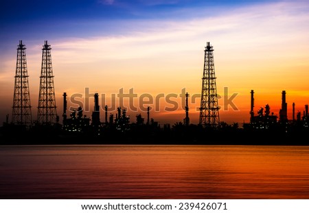 Oil refinery or petrochemical industry at before sunrise in thailand. It is beautiful in siluette tone.