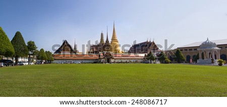 The beauty of the Emerald Buddha Temple at afternoon. And while the gold of the temple catching the light. This is an important buddhist temple of thailand and a famous tourist destination.