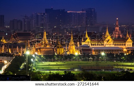 The beauty of the Emerald Buddha Temple at night. And while the gold of the temple catching the light. This is an important buddhist temple of thailand and a famous tourist destination.