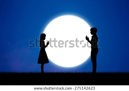 Abstract silhouette people praying in blue sky at night moon.