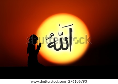 people  praying at the sunset.The words spell is Allah means the god of Islam.
