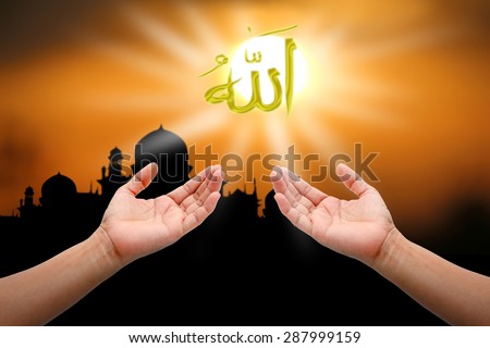 Hands of people praying to allah god of Islam on sunset.The words spell is Allah means the God of Islam.