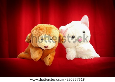 Hand puppet for child on red theater background.