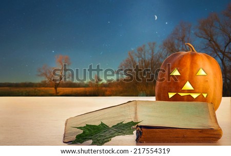 book and pumpkin in Halloween style
