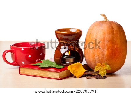Halloween books &  pumpkin, cup and candle