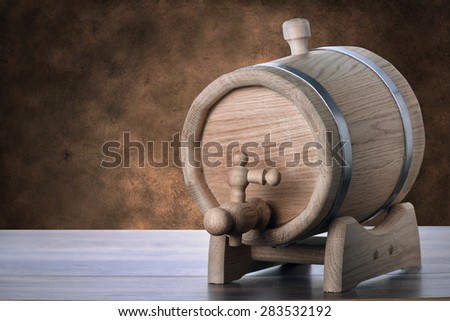 Oak barrels on a brown grunge background