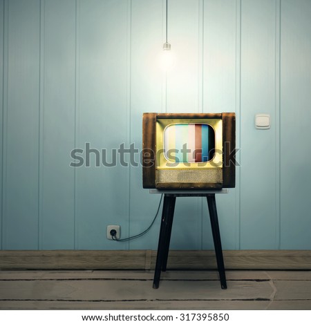 Ascetic vintage interior with old TV and a lamp.