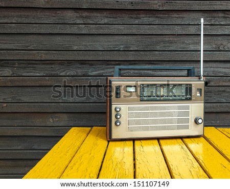 Old Radio On Yellow Table