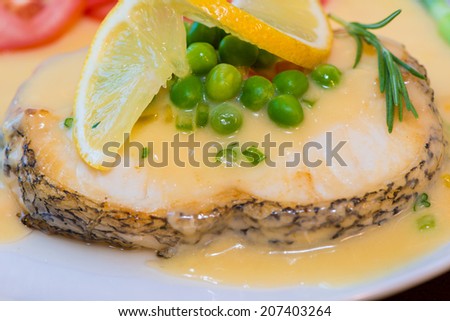 Fried cod fillets and vegetables