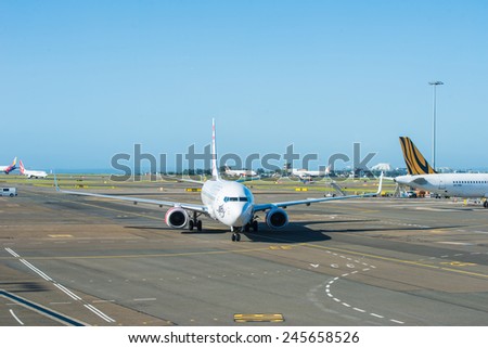 SYDNEY - December 30: Aircrafts of the Virgin Australia fleet at Sydney Domestic Airport December 30, 2014. Virgin Australia is Australia\'s second largest airline
