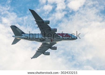 Singapore - August 01, 2015: Singapore 50years National Day Singapore Airlines Airbus A380 flew over the city