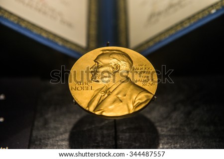 Singapore - November 14, 2015:  A golden image of the Nobel Prize decorates the front of the Science Museum in Singapore, 14 Nov 2015