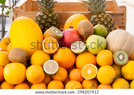 Group of mediterranean fruits set on the table of a seller along the streets of Ortigia, the old Syracuse