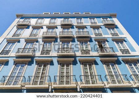 traditional building facade with characteristic balconies in Lisbon, Portugal