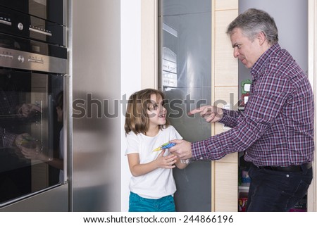 Father surprises his daughter taking candy