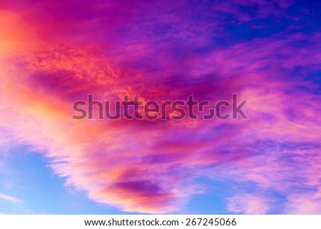 Colorful clouds on sunset sky. Natural background.