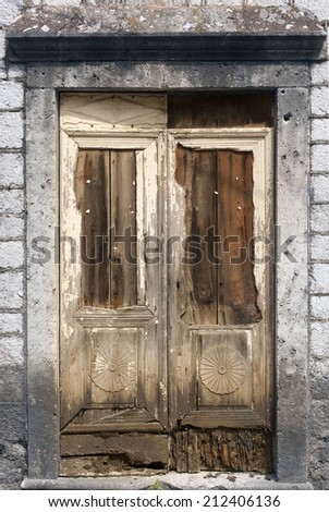 Old ancient ruined rotten doors