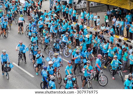 BANGKOK THAILAND - AUG 16: Thai people joined cycling in Bike for mom event to set a new world record for the greatest number of people cycling at once on August 16, 2015 in Bangkok, Thailand.