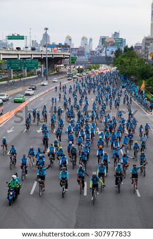 BANGKOK THAILAND - AUG 16: Thai people joined cycling in Bike for mom event to set a new world record for the greatest number of people cycling at once on August 16, 2015 in Bangkok, Thailand.
