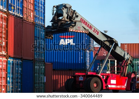 BANGKOK, THAILAND - 14 NOVEMBER 2015 : Container forklift truck start to work in morning in Ladkrabang port, Bangkok, Thailand.