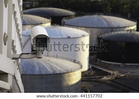Security camera in petrochemical refinery industry, heavy industrial plant