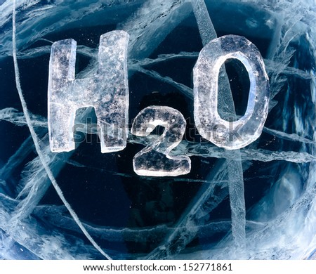 Chemical formula of water H2O made from ice on winter frozen lake Baikal