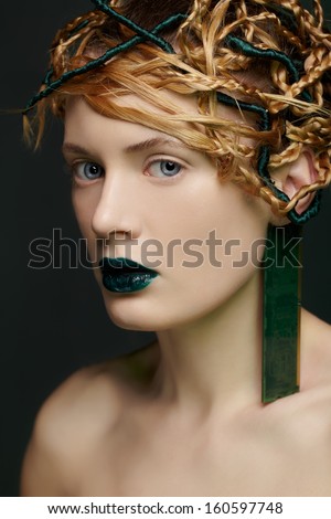 portrait of beautiful young woman in ear-ring made of ddr ram memory