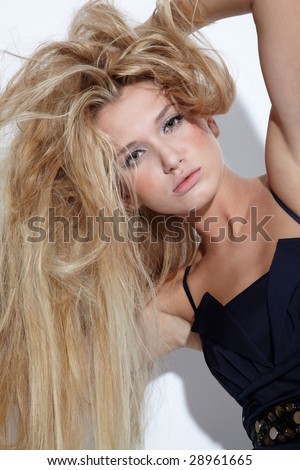 stock photo portrait of beautiful european blonde model showing her long
