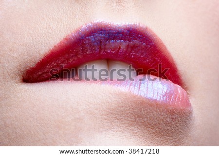 close up portrait of european girl biting her lips