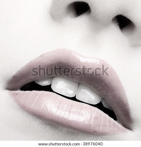 close-up of beautiful girl's lips zone make up