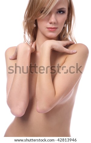 stock photo beautiful topless blonde model closes her chest with arms
