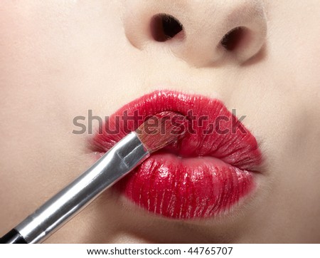 close up of girl\'s lips zone makeup