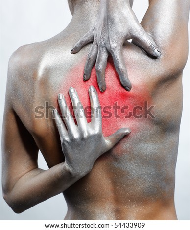 stock photo portrait of nude girl's back painted with silver