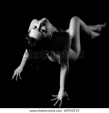 stock photo portrait of nude girl posing on black Save to a lightbox 