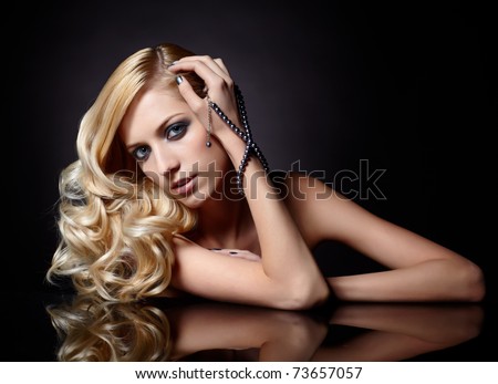 Glamour Portrait Of Beautiful Curly Blonde Girl And Her Reflection In