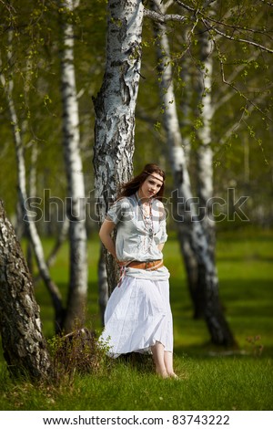 stock photo outdoor portrait of beautiful hippie girl posing in birch 