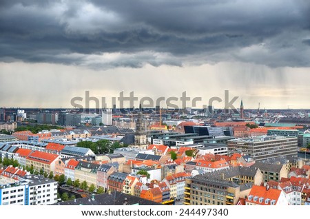 The bird\'s eye view from the Church of Our Saviour with the rain over Copenhagen, Denmark.