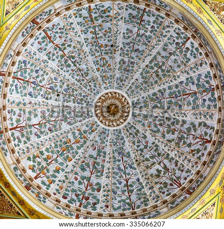 ISTANBUL, TURKEY - JULY 12, 2014: A floral designs in the ceiling decorations in the Hall with a Fountain in Harem of Topkapi Palace, Istanbul, Turkey
