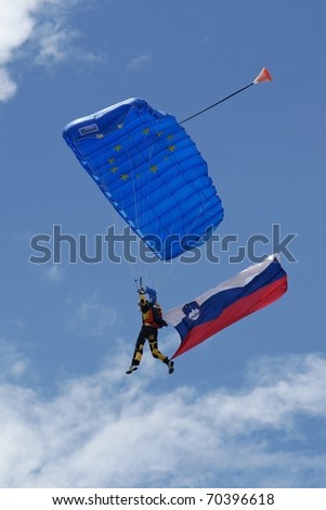 PORTOROZ, SLOVENIA - MAY 19: Parachute whit Slovenian flag on the Portoroz airshow, Slovenia, May 19, 2010