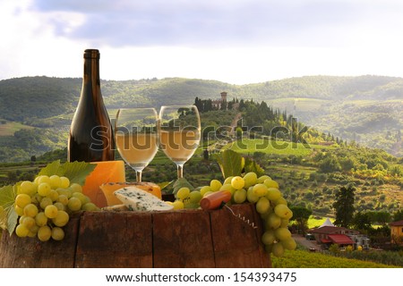 White Wine With Barrel On Vineyard In Chianti, Tuscany, Italy