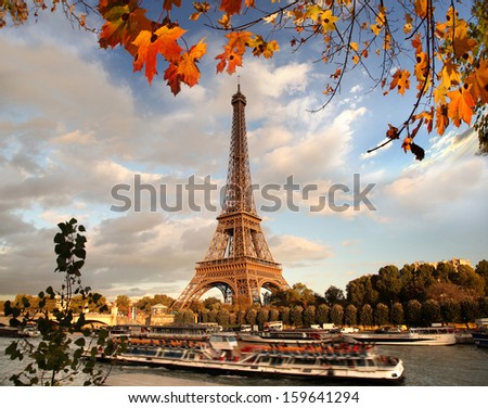 Eiffel Tower with autumn leaves in Paris France Eiffel Tower with autumn leaves in Paris France