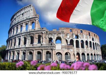 Colosseum with flag of Italy in Rome