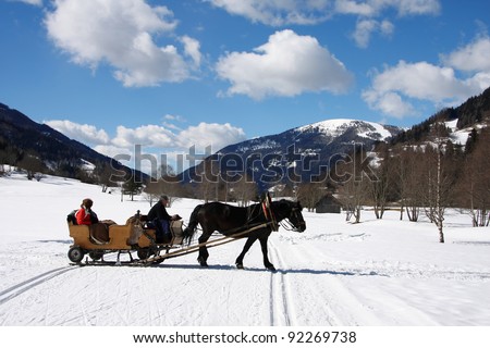 Winter in Alps,  sleigh with horse