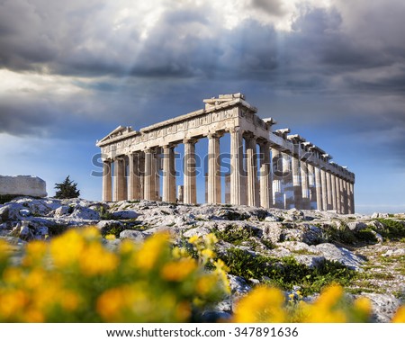 Parthenon temple with spring flowers on the  Acropolis in Athens, Greece