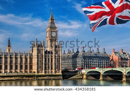 Big Ben with flag of England in London, UK