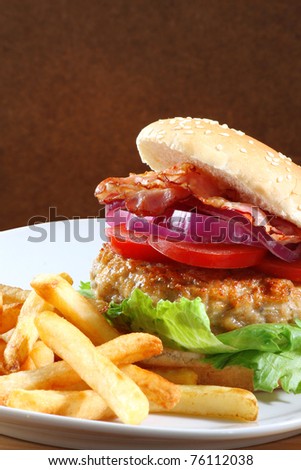 Bacon burger with fries - copy space
